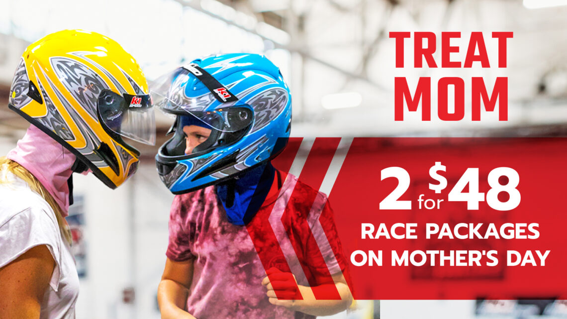Two women head to head (or helmet to helmet) in competitive spirit