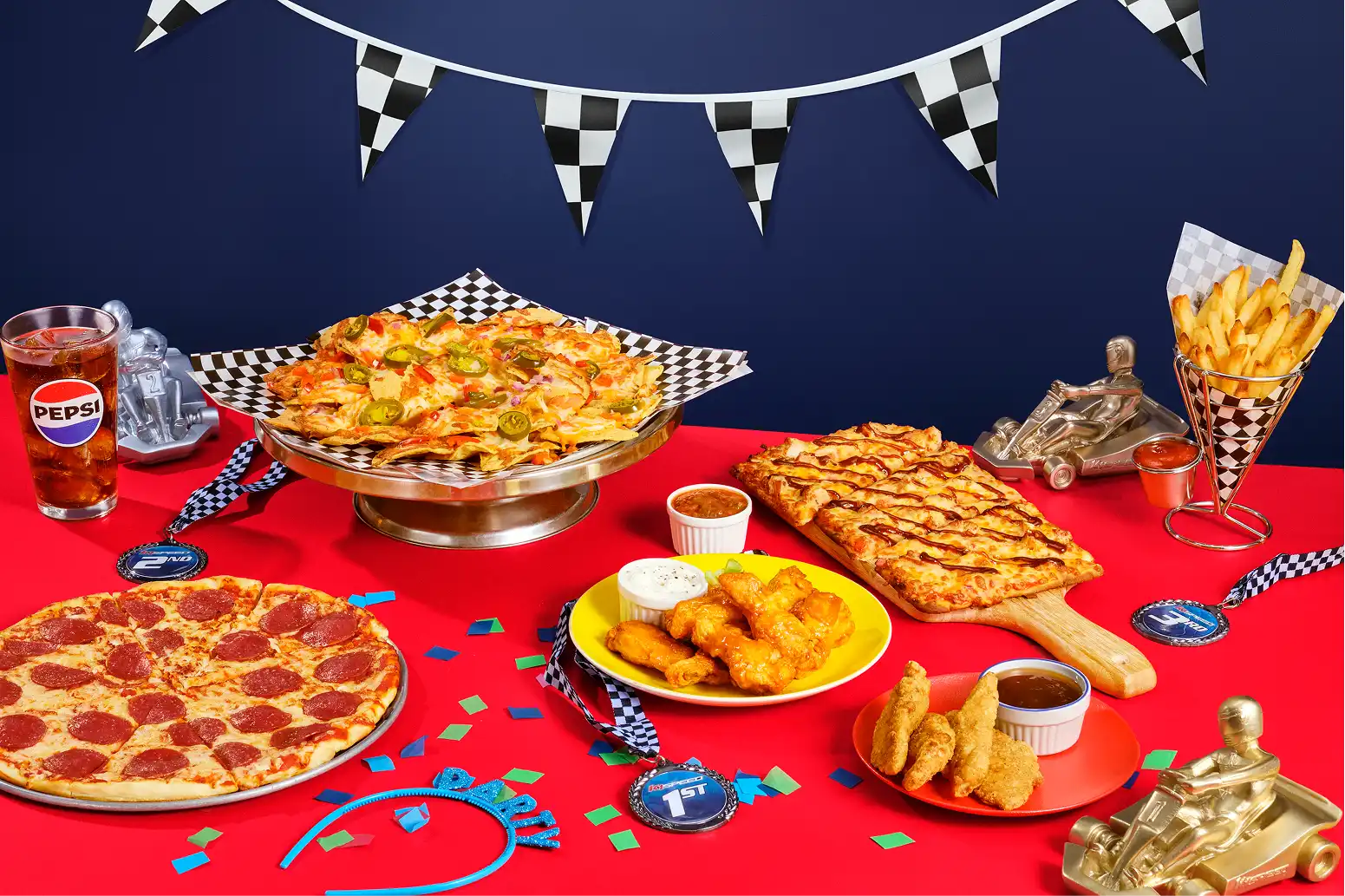 go kart birthday party packages Mississauga Go-kart birthday party food package with pizza, nachos, wings, fries, and racing-themed decorations