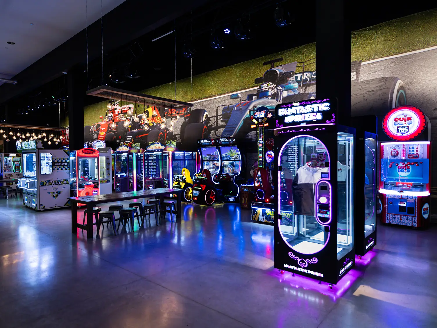 what do all inclusive go karting birthday party packages include Arcade games and entertainment area at a go-karting birthday party venue